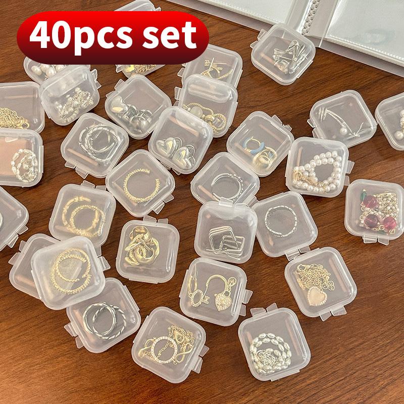40 шт./компл. Мини прозрачный пластиковый ящик для хранения ювелирных изделий, прозрачный органайзер для хранения, многофункциональное портативное хранилище
40 шт./компл. Мини прозрачный пластиковый ящик для хранения ювелирных изделий, прозрачный органайзер для хранения, многофункциональное портативное хранилище