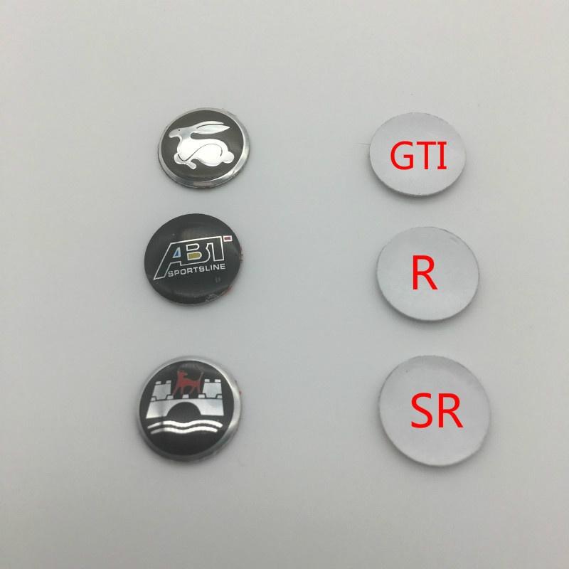 2 шт. 14 мм GTI R ABT Эмблема Наклейка Автомобильный ключ дистанционного аудио значок наклейка для Jetta Passat Polo Tiguan Touareg 1 VW Logo
2 шт. 14 мм GTI R ABT Эмблема Наклейка Автомобильный ключ дистанционного аудио значок наклейка для Jetta Passat Polo Tiguan Touareg 1 VW Logo
