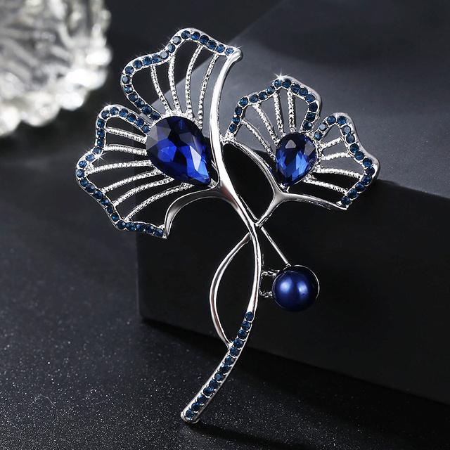 Брошь в виде листа гинкго женская синтетическая жемчужина брошь-булавка фиксированная одежда осенние и зимние пальто аксессуары
Брошь в виде листа гинкго женская синтетическая жемчужина брошь-булавка фиксированная одежда осенние и зимние пальто аксессуары