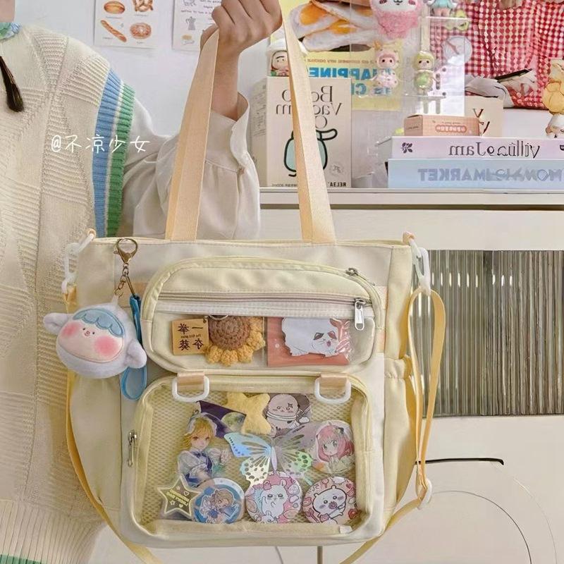 Cute two-dimensional millet transparent messenger bag, college girl large-capacity tote bag, bar and bar pain bag baby bag
Cute two-dimensional millet transparent messenger bag, college girl large-capacity tote bag, bar and bar pain bag baby bag