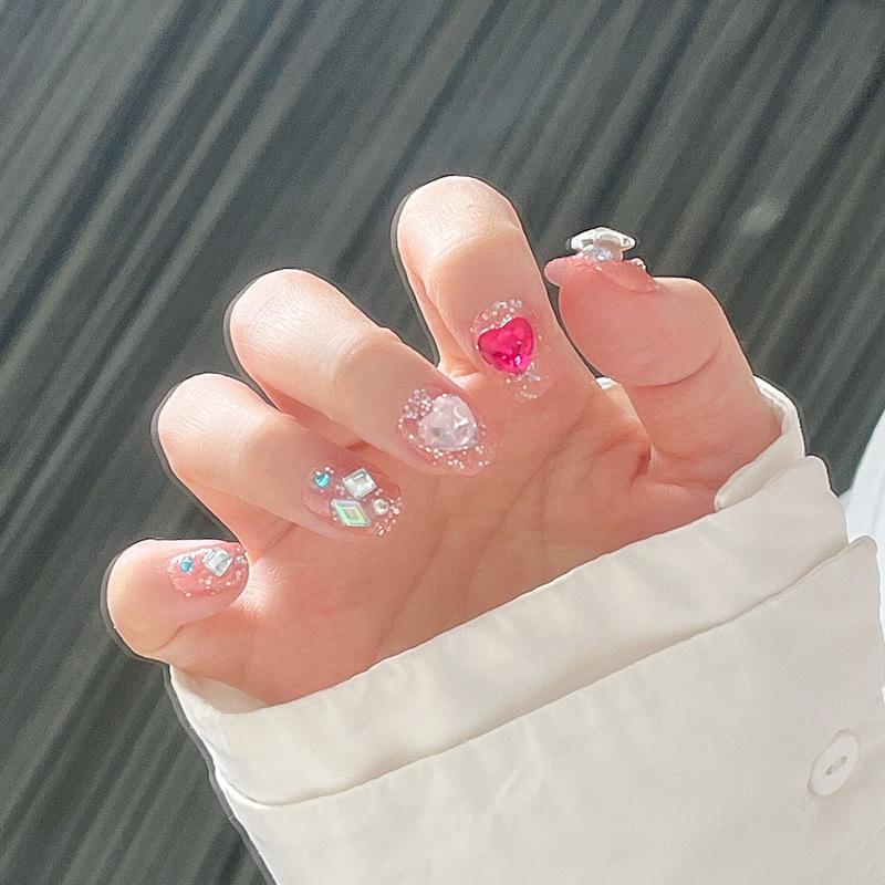 Xiaohongshu Pink Heart Diamond Nail Patches - Short Transparent Wearable Manicure Tips Gold-Plated Topcoat
Xiaohongshu Pink Heart Diamond Nail Patches - Short Transparent Wearable Manicure Tips Gold-Plated Topcoat