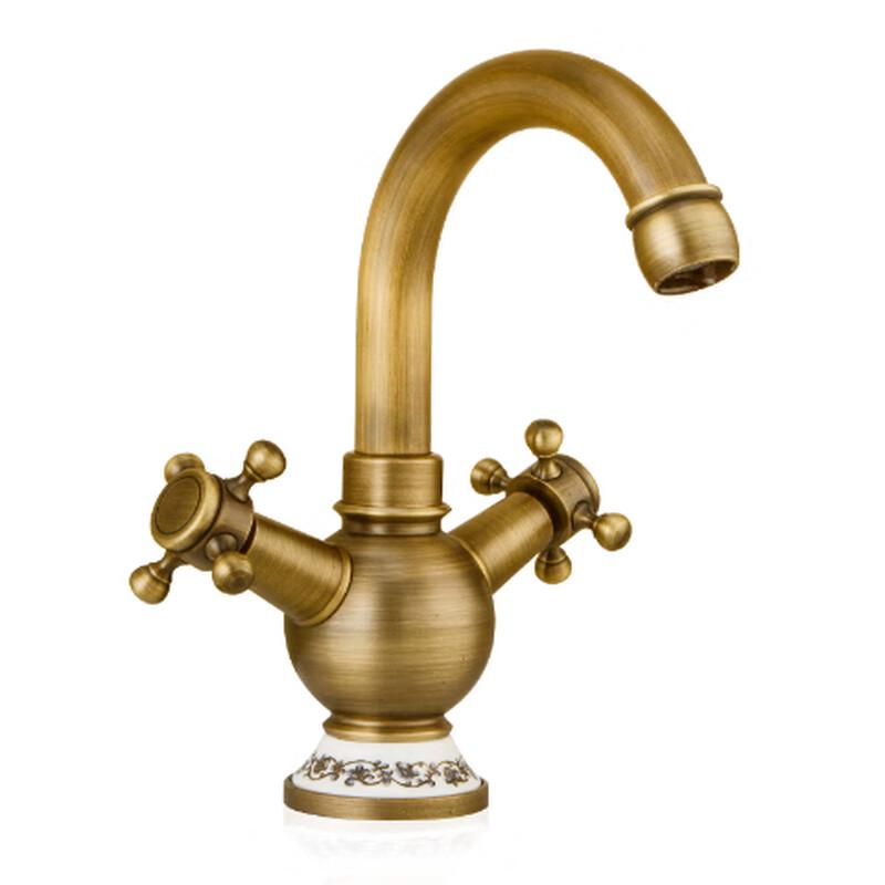 Vintage Antique Brass Lavatory Faucet with Blue & White Porcelain Handles
Vintage Antique Brass Lavatory Faucet with Blue & White Porcelain Handles