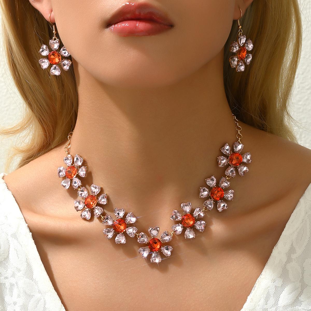Obega 2 PCS Elegant Flower Shape Pendant Choker Necklace Hook Earrings Shiny Orange Crystal Stone Exquisite Gold Color Chain
Obega 2 PCS Elegant Flower Shape Pendant Choker Necklace Hook Earrings Shiny Orange Crystal Stone Exquisite Gold Color Chain