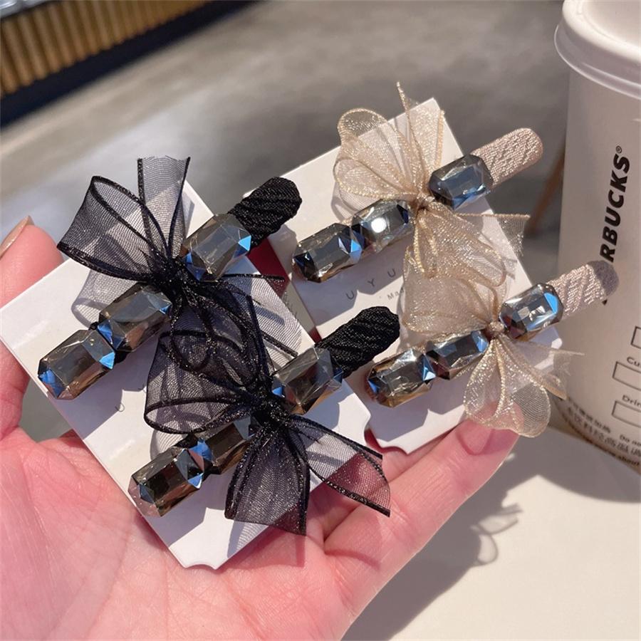 Fashion Xiaojuan yarn bow crystal duckbill clip one-word clip simple style bangs clip side clip new hairpin hair accessories
Fashion Xiaojuan yarn bow crystal duckbill clip one-word clip simple style bangs clip side clip new hairpin hair accessories