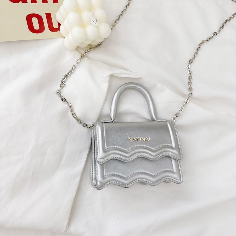 Stylish Korean Mini Shoulder Bag For Kids Perfect For Summer Outings In Black White Pink Purple And Silver срібний
Stylish Korean Mini Shoulder Bag For Kids Perfect For Summer Outings In Black White Pink Purple And Silver срібний