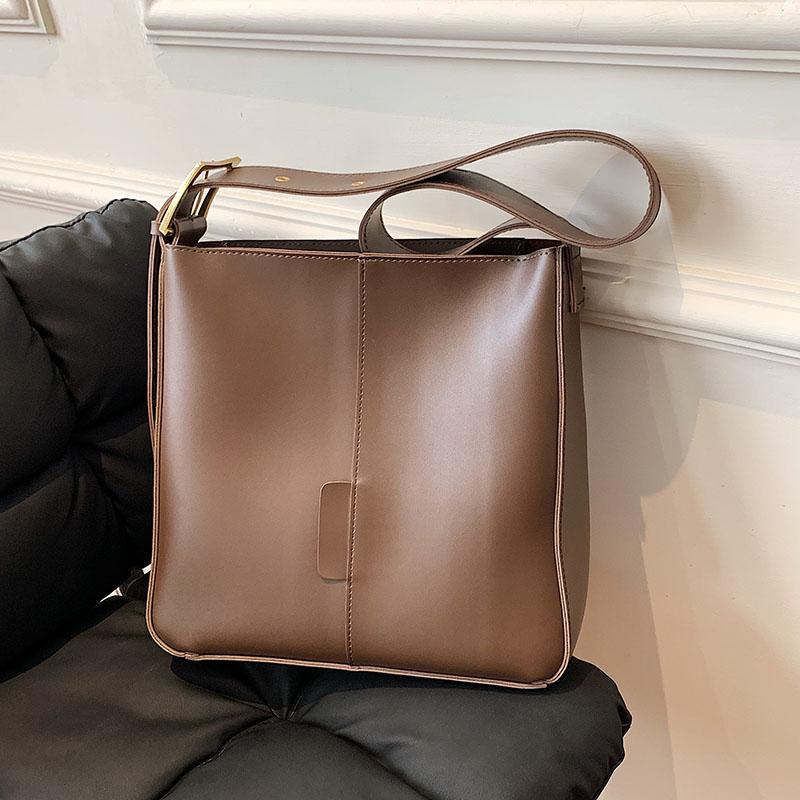 Осенние сумки-ведра большой вместимости, новые женские модные универсальные сумки через плечо, простые женские сумки-тоуты для поездок на работу
Осенние сумки-ведра большой вместимости, новые женские модные универсальные сумки через плечо, простые женские сумки-тоуты для поездок на работу