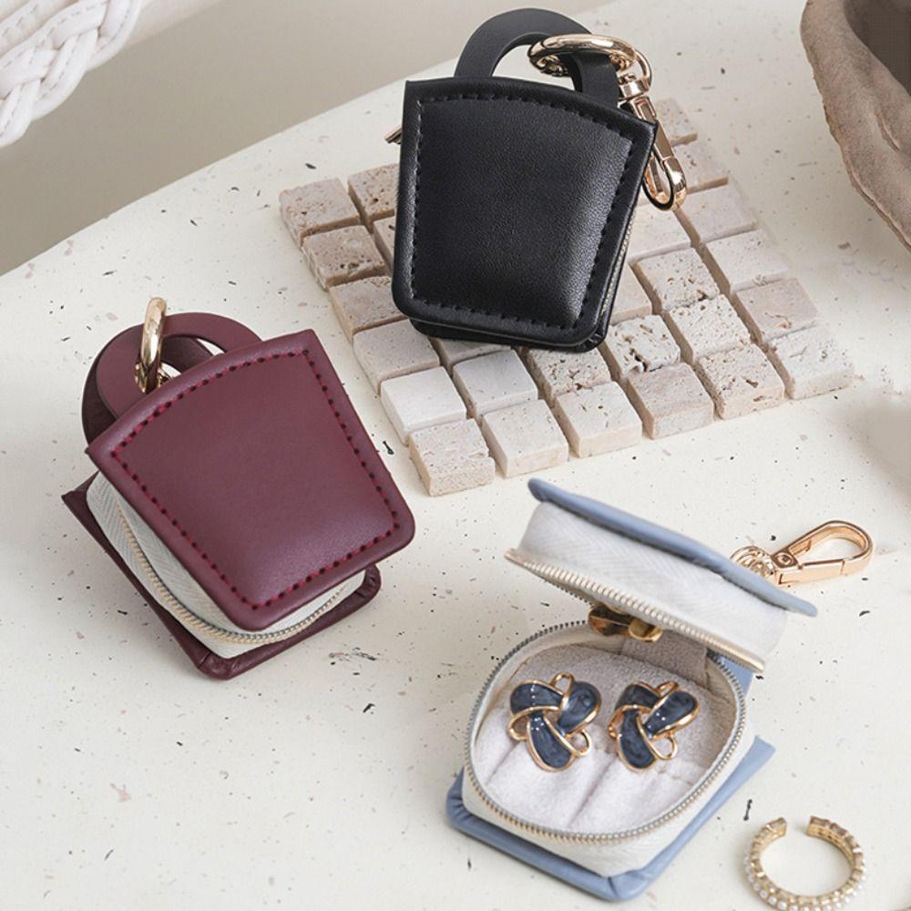 Mini Earrings Ring Packing Box Necklace Bracelet Jewelry Storage Case Jewelry Bag Keychain Gifts вина червоного кольору
Mini Earrings Ring Packing Box Necklace Bracelet Jewelry Storage Case Jewelry Bag Keychain Gifts вина червоного кольору