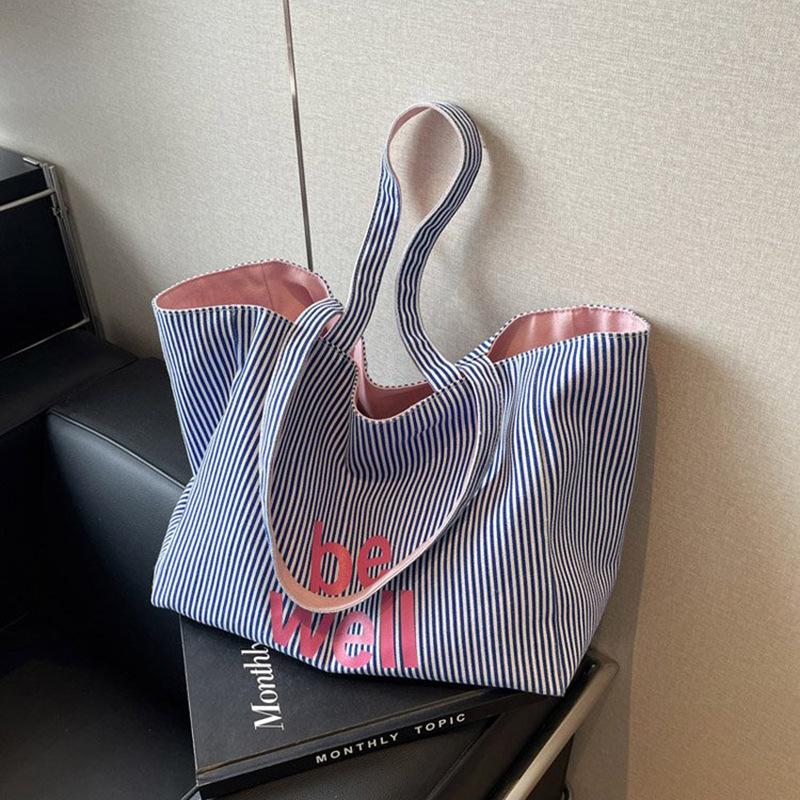 Casual Large Stripe Women s Shoulder Bag New Fashion Commuter Tote Bag High Capaci Canvas Handbag for Youth bolso mujer 53x18x31cm
Casual Large Stripe Women s Shoulder Bag New Fashion Commuter Tote Bag High Capaci Canvas Handbag for Youth bolso mujer 53x18x31cm