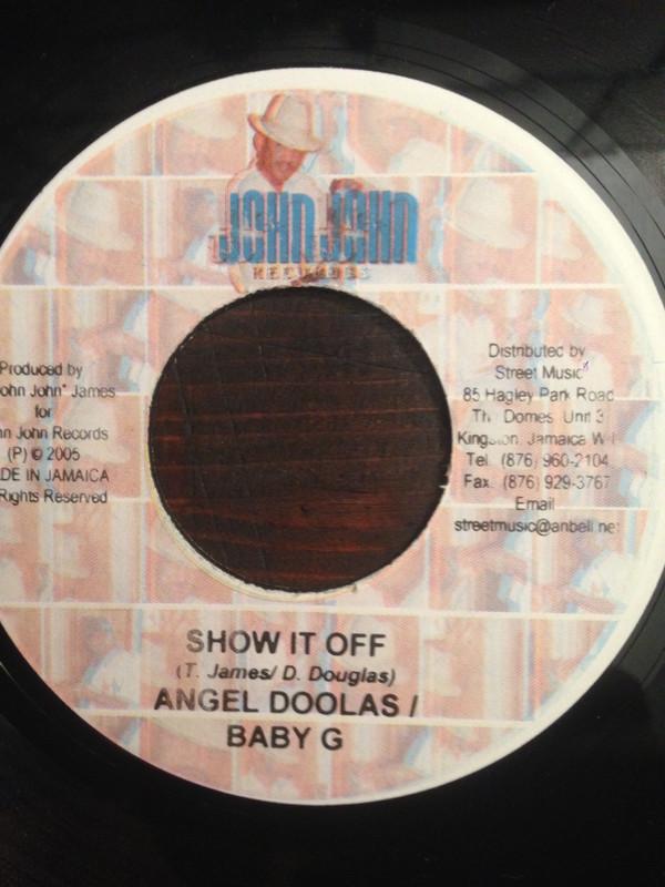 7inch Record ANGEL DOOLAS & BABY G / VOICEMAIL - Show It Off / Tek A Hike NONE John John Recor 2005 Jamaica Reggae, Ska & Dub Used
7inch Record ANGEL DOOLAS & BABY G / VOICEMAIL - Show It Off / Tek A Hike NONE John John Recor 2005 Jamaica Reggae, Ska & Dub Used