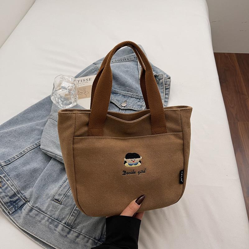 Embroidered Thickened Handbags for Women Outing Portable Simple Ladies Tote Mom Bag Large Capacity Female Work Lunch Bag Bento хакі
Embroidered Thickened Handbags for Women Outing Portable Simple Ladies Tote Mom Bag Large Capacity Female Work Lunch Bag Bento хакі