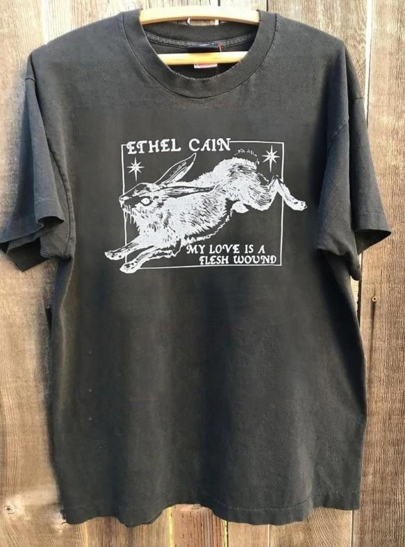 Ethel Cain My Love Is A Flesh Wound Vtg Charcoal Short Sleeve T shirt NH26300 Unisex T-Shirt XXXXL
Ethel Cain My Love Is A Flesh Wound Vtg Charcoal Short Sleeve T shirt NH26300 Unisex T-Shirt XXXXL
