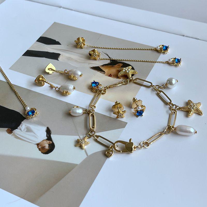 Ocean Series Luxury Starfish & Crab Pearl Jewelry Set: Stud Earrings, Dangle Earrings, Bracelet, Necklace
Ocean Series Luxury Starfish & Crab Pearl Jewelry Set: Stud Earrings, Dangle Earrings, Bracelet, Necklace