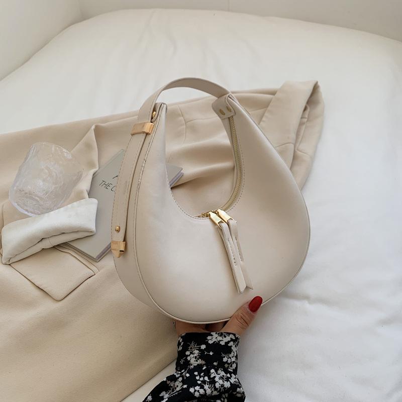 Women s bag high-end French niche bag women s autumn versatile new trendy crescent bag shoulder armpit bag бежевий
Women s bag high-end French niche bag women s autumn versatile new trendy crescent bag shoulder armpit bag бежевий