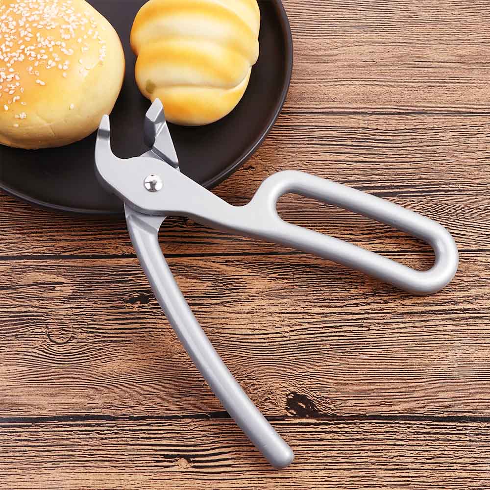 Kitchen Universal Pliers Tongs Heavy Duty Pizza Pan Gripper Dishes Clip Pots Clamp Bowl Clip 
Kitchen Universal Pliers Tongs Heavy Duty Pizza Pan Gripper Dishes Clip Pots Clamp Bowl Clip