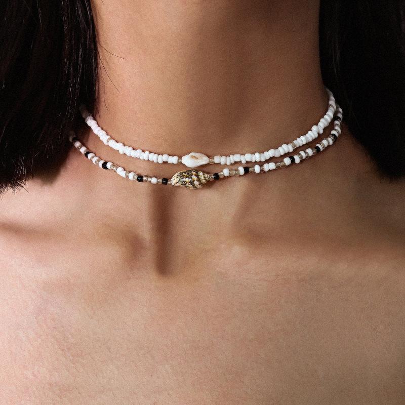 2Pcs/Set Puka Shell Pendants Necklace for Women Black White Beads Choker Collier Femme Vintage Bohemian Summer Kpop Y2K Jewelry
2Pcs/Set Puka Shell Pendants Necklace for Women Black White Beads Choker Collier Femme Vintage Bohemian Summer Kpop Y2K Jewelry