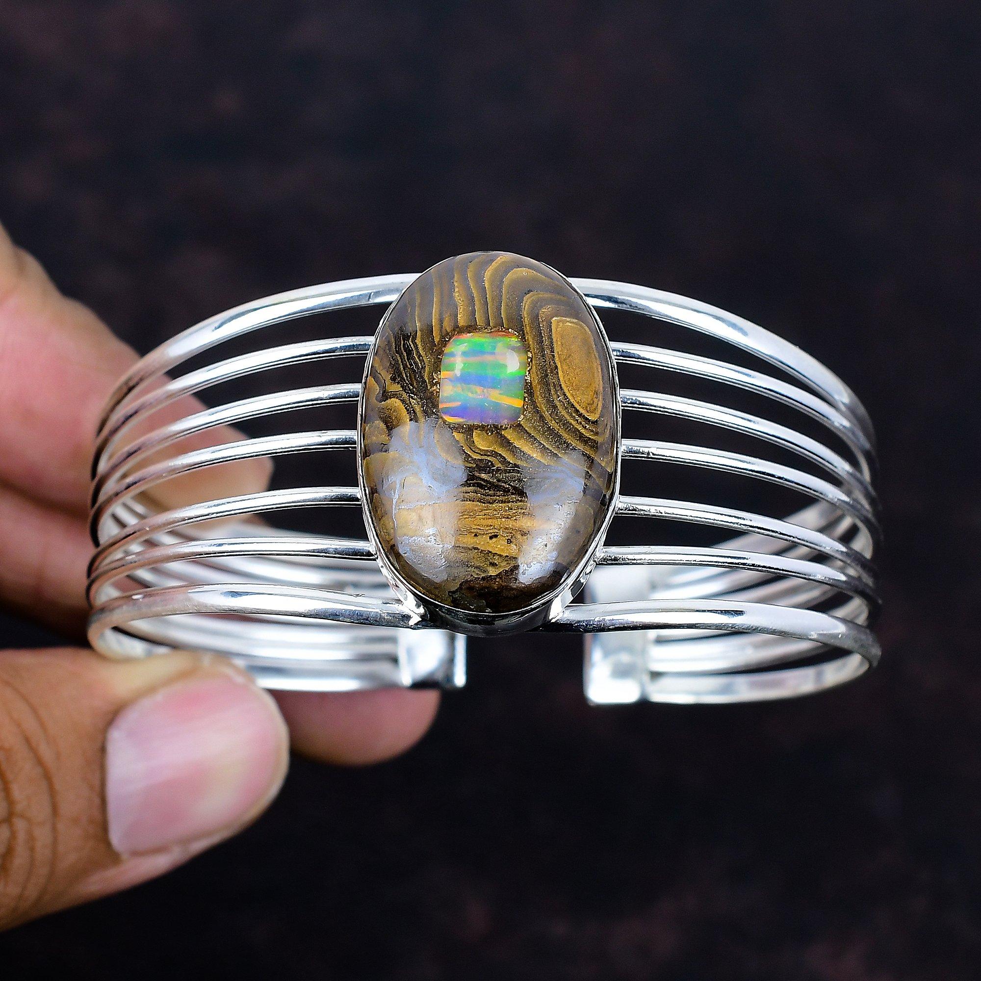 Ethopian opal in boulder opal bangle gemstone antique jewelry 925 sterling silver cuff bracelet adjustable bangle handmade bangle for gifts
Ethopian opal in boulder opal bangle gemstone antique jewelry 925 sterling silver cuff bracelet adjustable bangle handmade bangle for gifts