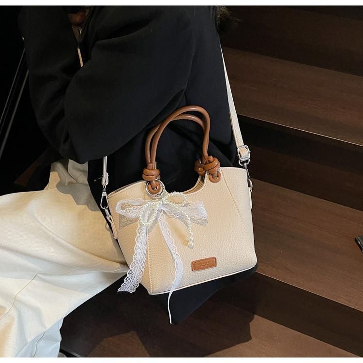 Premium sense niche contrasting color bag 2025 new trendy fashion shoulder handbag versatile messenger bucket bag бежевий
Premium sense niche contrasting color bag 2025 new trendy fashion shoulder handbag versatile messenger bucket bag бежевий