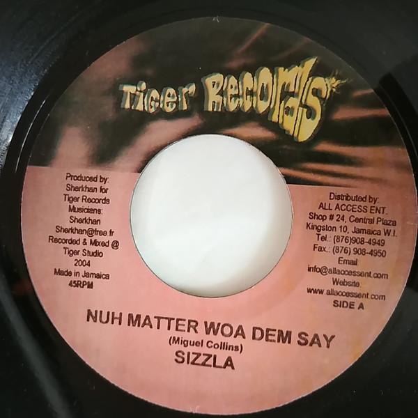 7inch Record SIZZLA - Nuh Matter Woa Dem Say NONE Tiger Records 2004 Jamaica Reggae, Ska & Dub Used
7inch Record SIZZLA - Nuh Matter Woa Dem Say NONE Tiger Records 2004 Jamaica Reggae, Ska & Dub Used