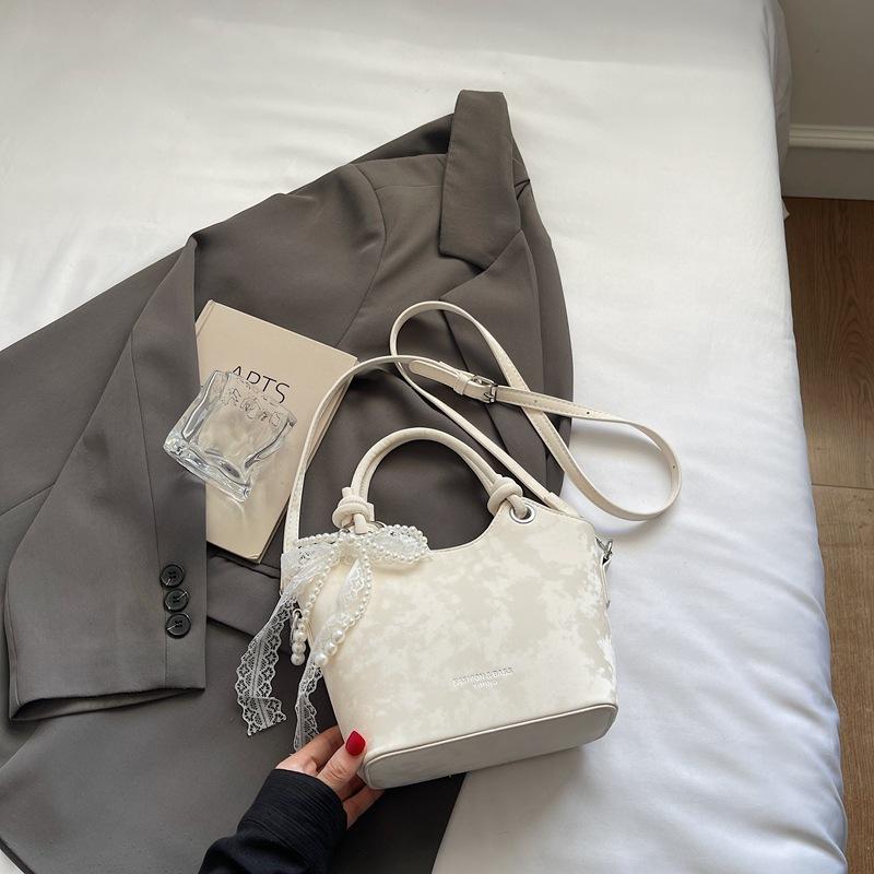 2025 summer, this year s popular retro fashion high-value portable bucket bag commuter niche messenger women s bag
2025 summer, this year s popular retro fashion high-value portable bucket bag commuter niche messenger women s bag