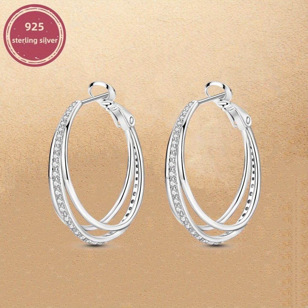 Серьги-пряжки из стерлингового серебра 925 пробы с тремя кольцами, подвески для женщин, модные аксессуары, праздничный подарок, ювелирные украшения, 1 пара сережек
Серьги-пряжки из стерлингового серебра 925 пробы с тремя кольцами, подвески для женщин, модные аксессуары, праздничный подарок, ювелирные украшения, 1 пара сережек