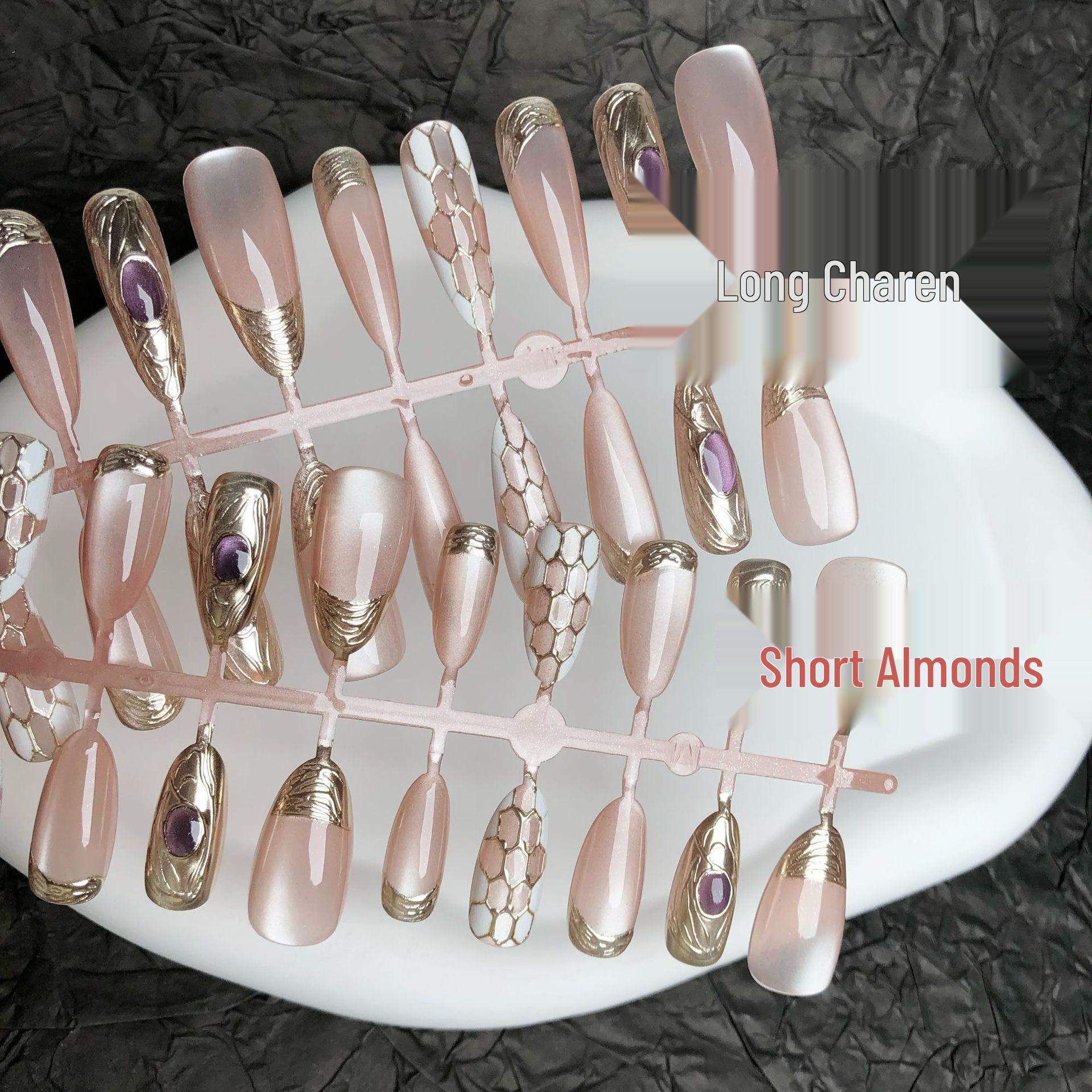 Serpent Pink Short Almond Press-On Nails: Snake Print Gilded Nail Art for Year of the Snake
Serpent Pink Short Almond Press-On Nails: Snake Print Gilded Nail Art for Year of the Snake