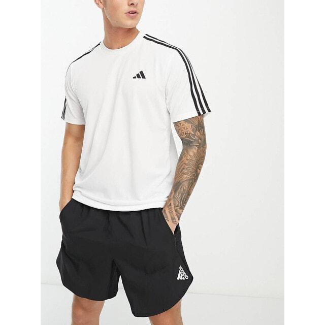 Белая футболка с 3 полосками adidas Training Essential
Белая футболка с 3 полосками adidas Training Essential