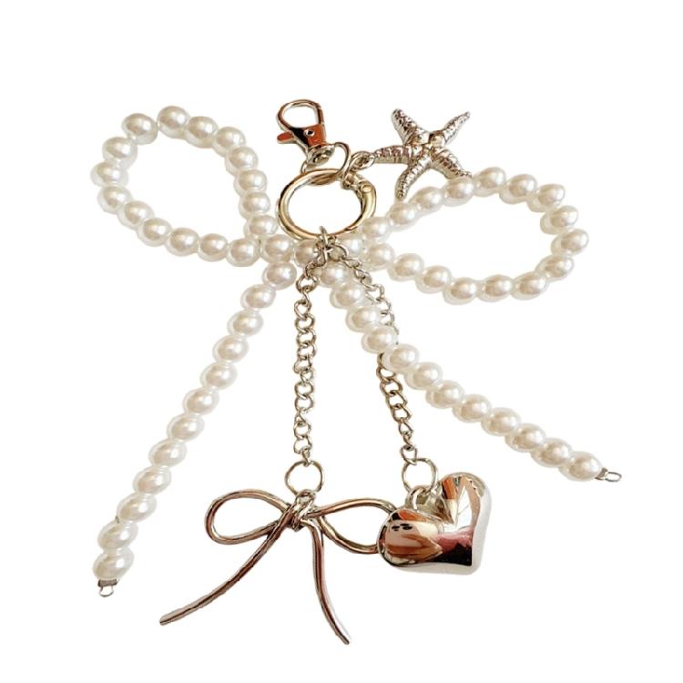 Fashion Marine Themed Keychain Bowknot Shaped Pearls Detail And Starfish Charm Stylish Functional Accessory 1
Fashion Marine Themed Keychain Bowknot Shaped Pearls Detail And Starfish Charm Stylish Functional Accessory 1