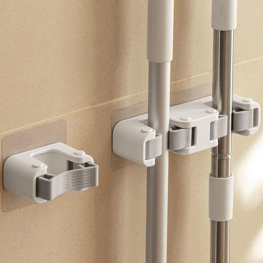 Настенный держатель для швабры Настенный зажим для хранения метла с горячим крючком 
Настенный держатель для швабры Настенный зажим для хранения метла с горячим крючком