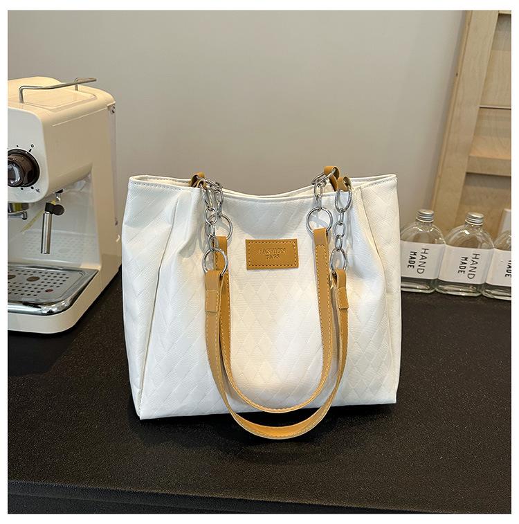 2024 Women s Large Capacity Texture Shoulder Bag - Trendy, Stylish Commuter Tote
2024 Women s Large Capacity Texture Shoulder Bag - Trendy, Stylish Commuter Tote