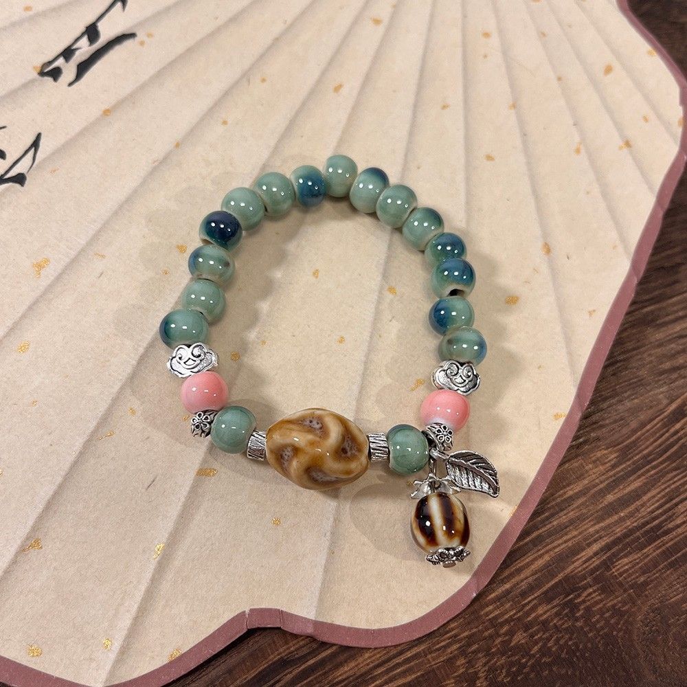 Ceramic Bracelet with Kiln Change Crackle Glaze Zen Buddhist Beads Animal Pendant New Chinese Style Elastic Boho
Ceramic Bracelet with Kiln Change Crackle Glaze Zen Buddhist Beads Animal Pendant New Chinese Style Elastic Boho