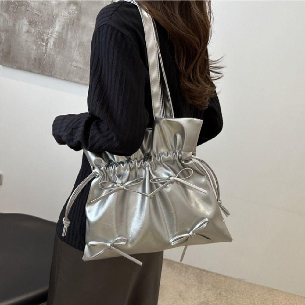 Кожаная сумка-ведро с бантом, большая вместительная сумка-тоут с бантом, модная женская сумка с завязкой-бантом
Кожаная сумка-ведро с бантом, большая вместительная сумка-тоут с бантом, модная женская сумка с завязкой-бантом