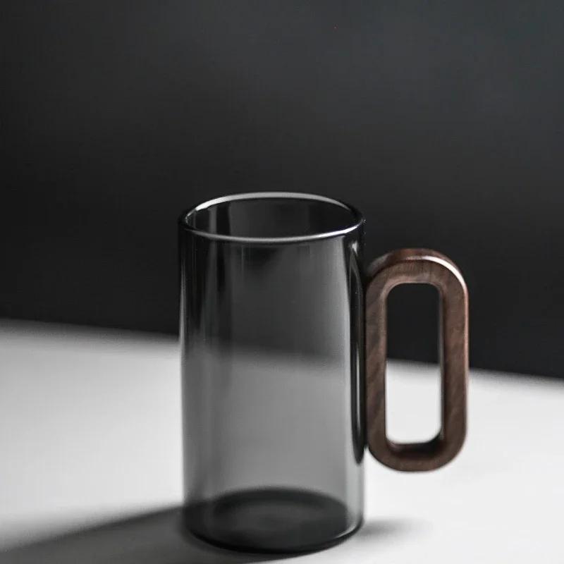 360 мл стеклянные однослойные чашки из боросиликатного стекла, чайная чашка с деревянной ручкой, термостойкие кофейные чашки, домашняя кружка для питьевой воды 360ML
360 мл стеклянные однослойные чашки из боросиликатного стекла, чайная чашка с деревянной ручкой, термостойкие кофейные чашки, домашняя кружка для питьевой воды 360ML