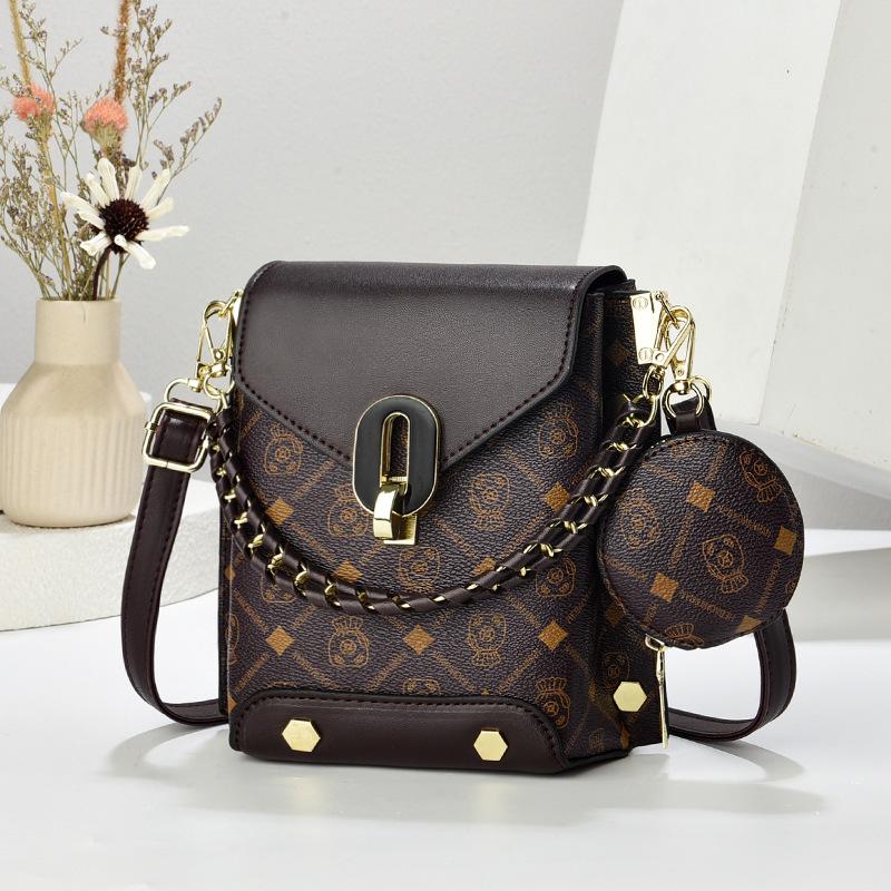 Temperament texture shoulder bag square vertical small square bag new messenger bag casual commuter women s bag bags 17*10*20 темно-коричневого кольору
Temperament texture shoulder bag square vertical small square bag new messenger bag casual commuter women s bag bags 17*10*20 темно-коричневого кольору