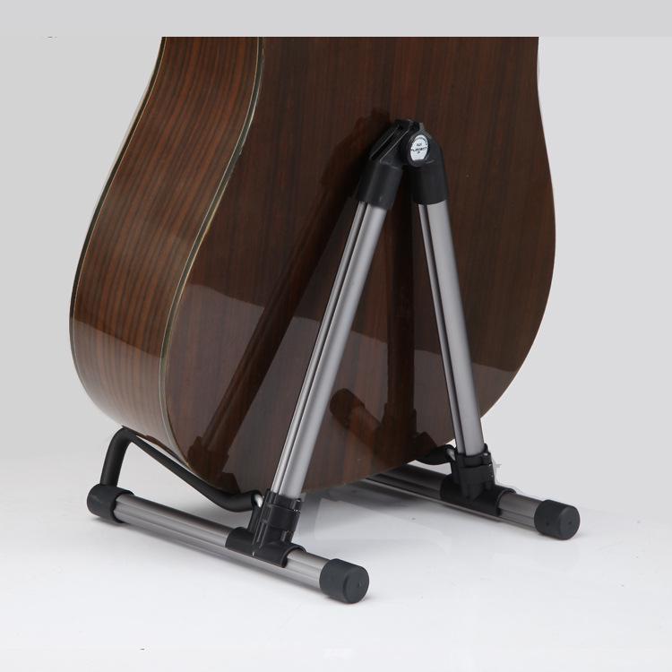 Folding Aluminum Alloy A-Frame Folk Guitar Stand сірий колір
Folding Aluminum Alloy A-Frame Folk Guitar Stand сірий колір