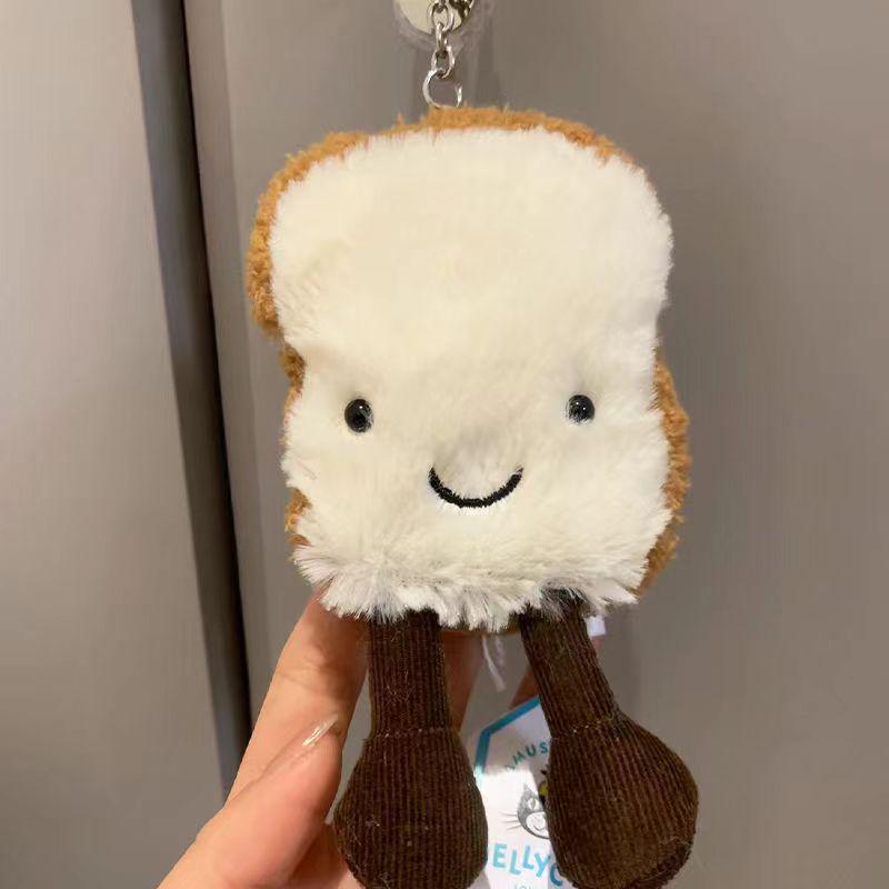 Английский Плюшевый брелок-подвеска Jellycat в виде ломтика тоста – Милый и забавный аксессуар для сумки Dust Bag with Three Tags
Английский Плюшевый брелок-подвеска Jellycat в виде ломтика тоста – Милый и забавный аксессуар для сумки Dust Bag with Three Tags