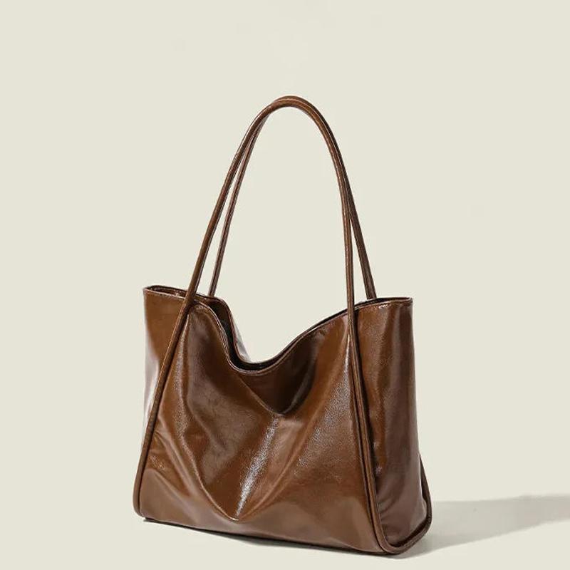 Новая мягкая кожаная сумка-тоут большой емкости с нишевым дизайном для ручного использования, женская сумка через плечо для поездок на работу и обратно
Новая мягкая кожаная сумка-тоут большой емкости с нишевым дизайном для ручного использования, женская сумка через плечо для поездок на работу и обратно