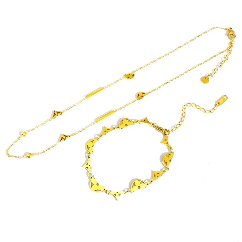 Four-Leaf Clover Titanium Steel Necklace & Bracelet Set – European & American Fashion Design with Hollow Clavicle Chain and Letter V.
Four-Leaf Clover Titanium Steel Necklace & Bracelet Set – European & American Fashion Design with Hollow Clavicle Chain and Letter V.