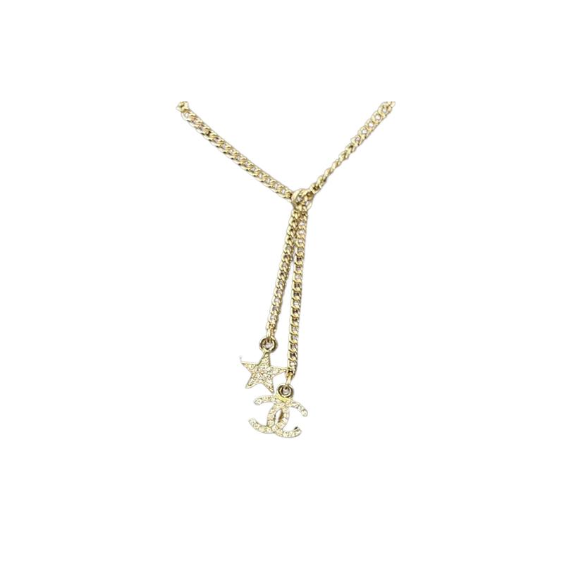 CHANEL Double C Star Double C Rhinestone Necklace Women s Gold золотий
CHANEL Double C Star Double C Rhinestone Necklace Women s Gold золотий