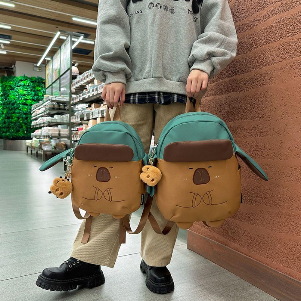 Cartoon Capybara Nylon Backpack Kawaii Shoulder Bag Funny Capybara School Bag Girls L рожевий
Cartoon Capybara Nylon Backpack Kawaii Shoulder Bag Funny Capybara School Bag Girls L рожевий