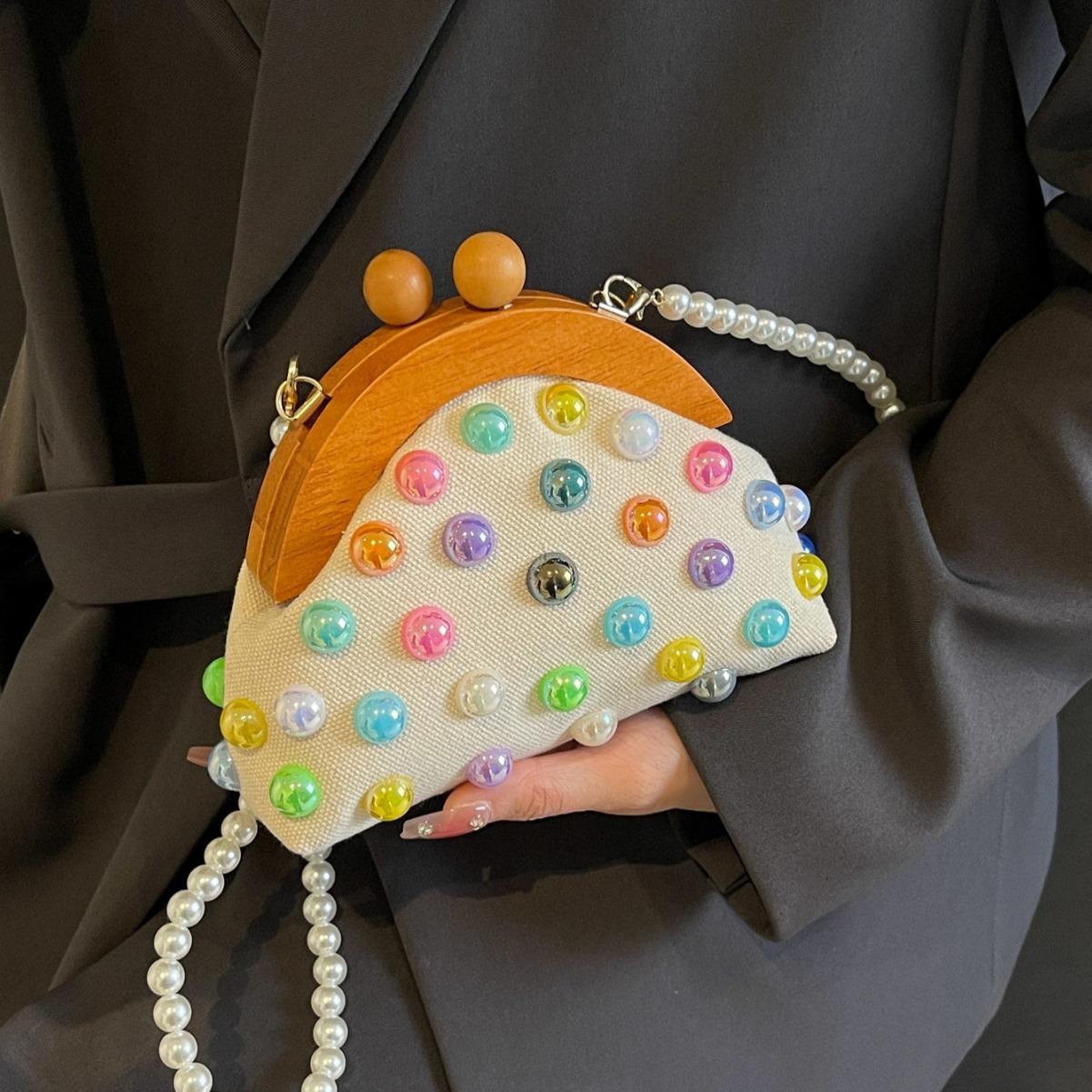 Fairy bag summer new women s bag 2025 flower foreign style small fragrance colored pearl shoulder shell bag
Fairy bag summer new women s bag 2025 flower foreign style small fragrance colored pearl shoulder shell bag