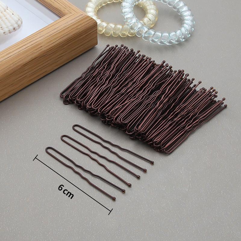 Чорна шпилька зі сталевим затискачем для укладання прямого чубчика та густого волосся
Чорна шпилька зі сталевим затискачем для укладання прямого чубчика та густого волосся