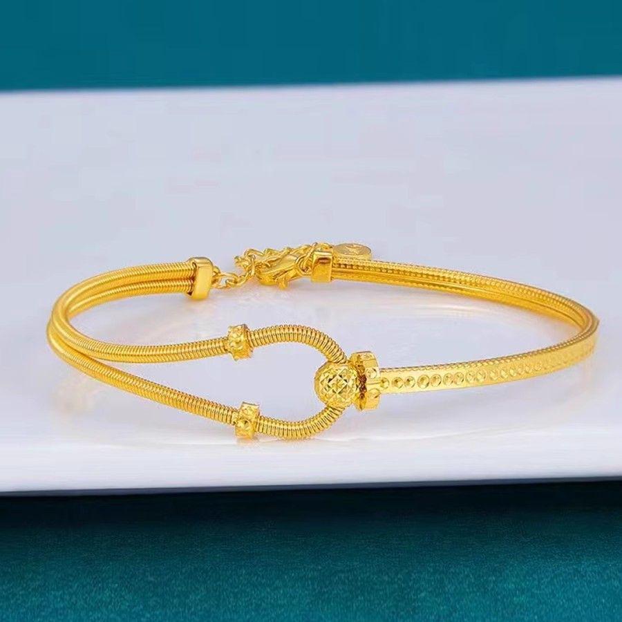 Vietnam Gold-Plated Interlocking Horseshoe Bangle with Adjustable AB Chain
Vietnam Gold-Plated Interlocking Horseshoe Bangle with Adjustable AB Chain