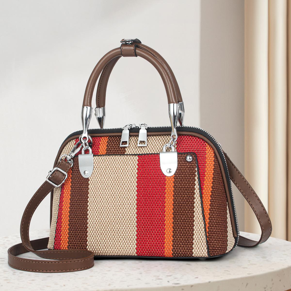 Handbag shoulder messenger bag fashion splicing striped women s bag contrasting color trend small bag versatile travel 15*11*17
Handbag shoulder messenger bag fashion splicing striped women s bag contrasting color trend small bag versatile travel 15*11*17