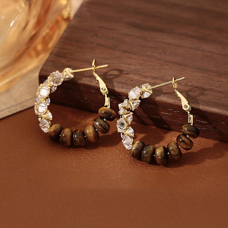 Autumn and winter retro tiger s eye stone round zircon earrings, earrings, temperament versatile earrings.
Autumn and winter retro tiger s eye stone round zircon earrings, earrings, temperament versatile earrings.