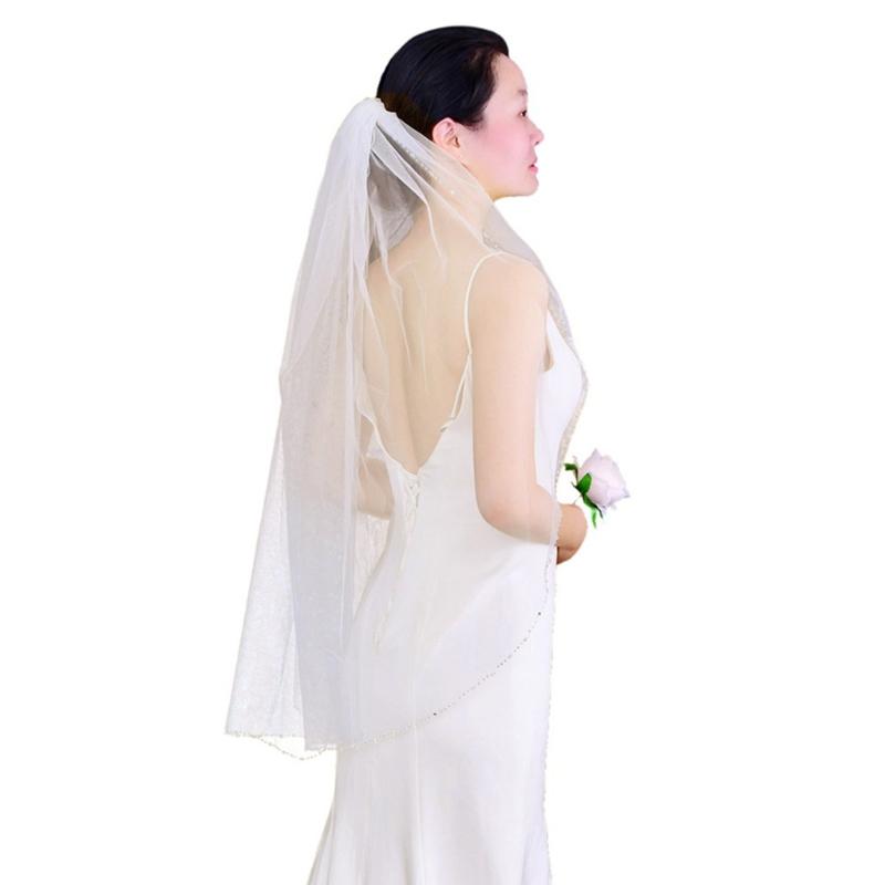 1 Tier Wedding Bridal Veil with Comb Sparkling Beads Adornment Edge Short Fingertip Length Cut Edge Tulle Veil 1 слоновая кость
1 Tier Wedding Bridal Veil with Comb Sparkling Beads Adornment Edge Short Fingertip Length Cut Edge Tulle Veil 1 слоновая кость