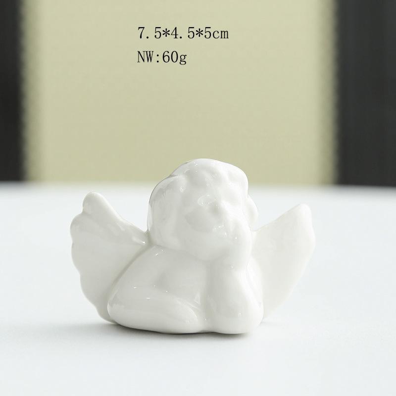 Elegant White Porcelain Angel Ornament - Modern European Style Christmas Decoration for Home or Desktop
Elegant White Porcelain Angel Ornament - Modern European Style Christmas Decoration for Home or Desktop