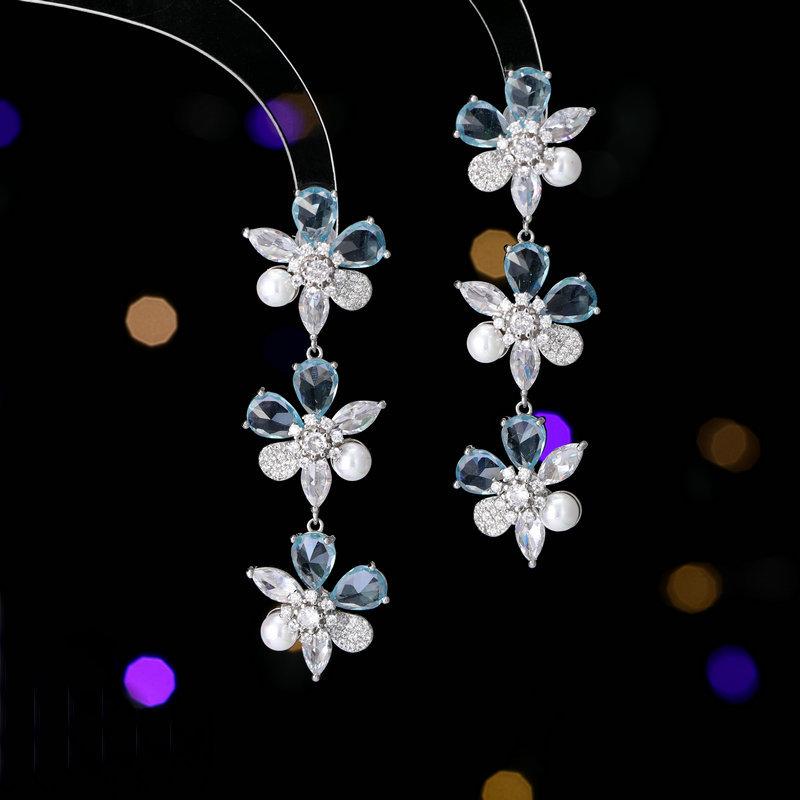 Women s Light Luxury Design Elegant Flower Imitation Pearl Long Earrings Fashionable And Versatile Niche Design Earrings
Women s Light Luxury Design Elegant Flower Imitation Pearl Long Earrings Fashionable And Versatile Niche Design Earrings