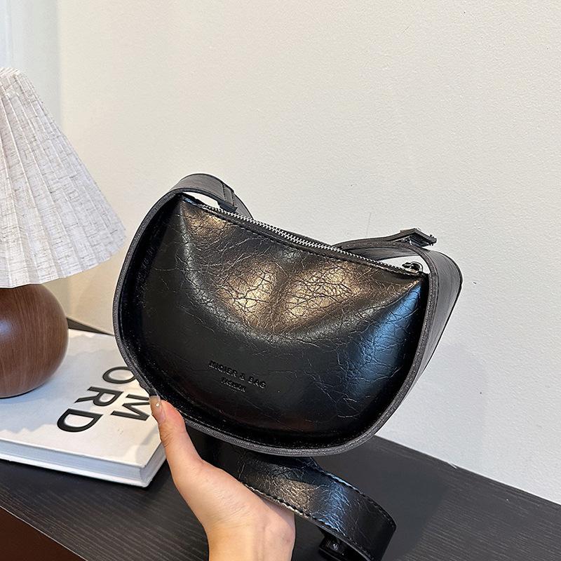 Niche fashion bag women s 2025 summer new simple small square bag high-end trendy casual messenger bag срібний
Niche fashion bag women s 2025 summer new simple small square bag high-end trendy casual messenger bag срібний