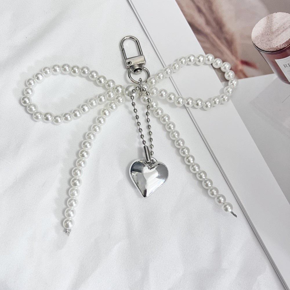 Korean Sweet Girl Pearl Bow Heart Pendant Keychain Bluetooth Earphone Charm
Korean Sweet Girl Pearl Bow Heart Pendant Keychain Bluetooth Earphone Charm