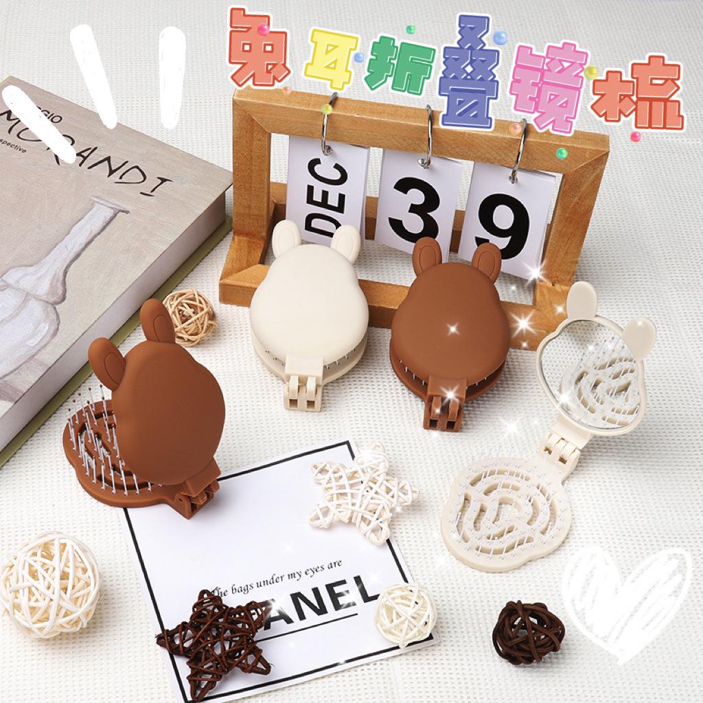 Y2K Fluffy Bunny Ear Folding Vent Mirror Comb – All-in-One Hair Styling Brush & Rake 18.7*6.5*2.3 cm
Y2K Fluffy Bunny Ear Folding Vent Mirror Comb – All-in-One Hair Styling Brush & Rake 18.7*6.5*2.3 cm